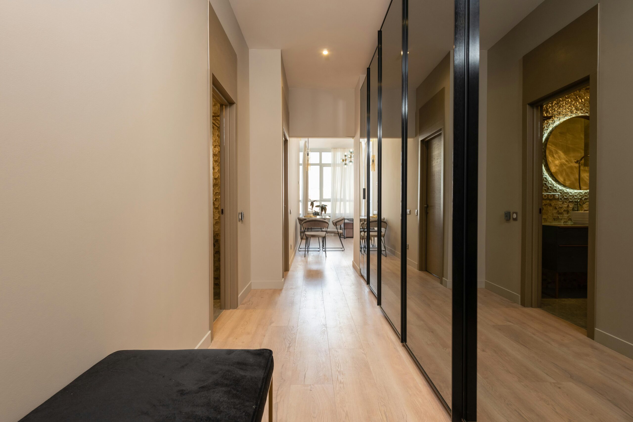 Corridor interior with mirrors near doorway